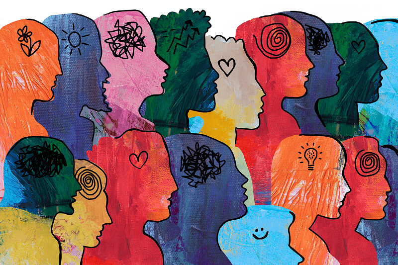 Illustration of many heads, with different symbols where the brains are located