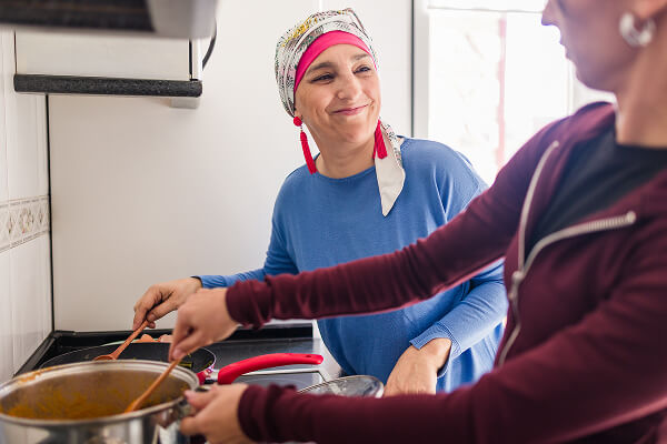 Two women cooking. 